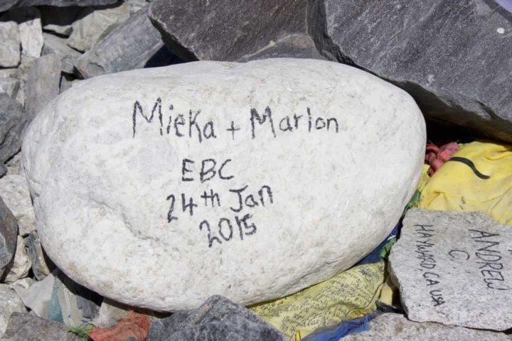 Mieka and marlon name on the stone at Everest Base Camp Trek