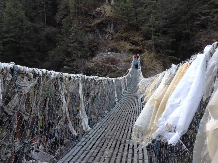 Buy a blessing scarf (Khada) and tie it on the suspension bridge you pass by