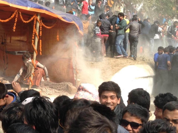 Sadhus dispersing crowd in Pashupati Nath temple