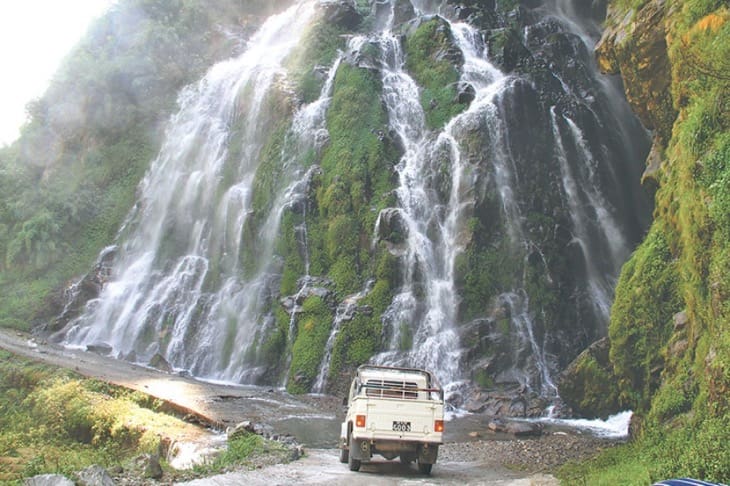 Jeep Crossing the waterfall Chame on the way to Annapurna Circuit 
