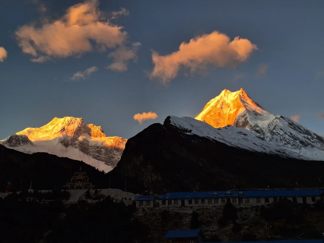 Day 6 sunrise orange mountain — Manaslu Circuit Trek day 6